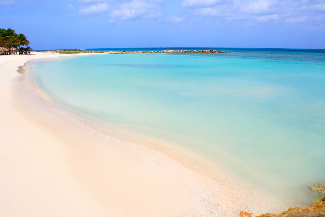 white sand beach and blue ocean