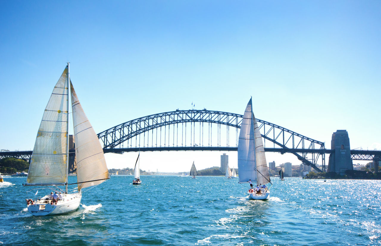 Boats sailing through the harbour in Sydney