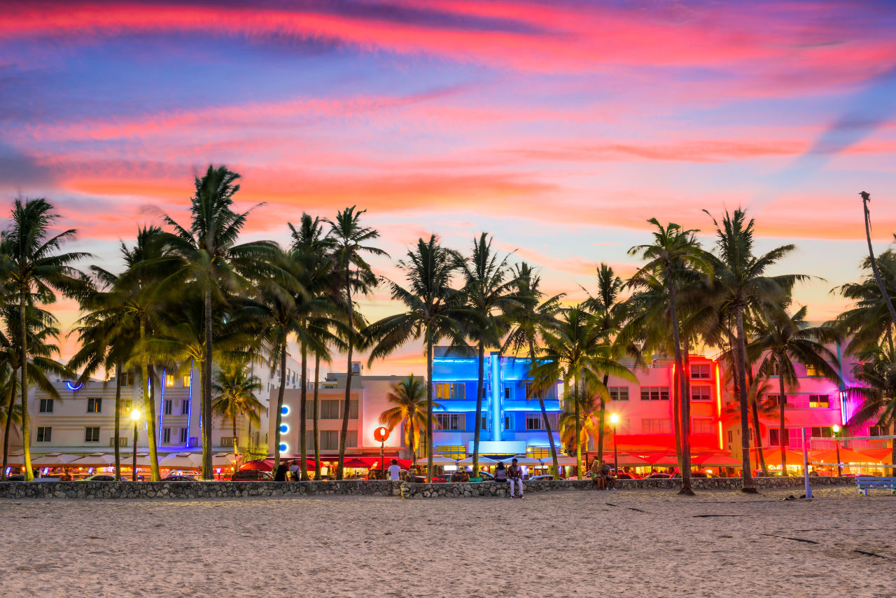 nightime on the beach looking at Ocean Drive Miami