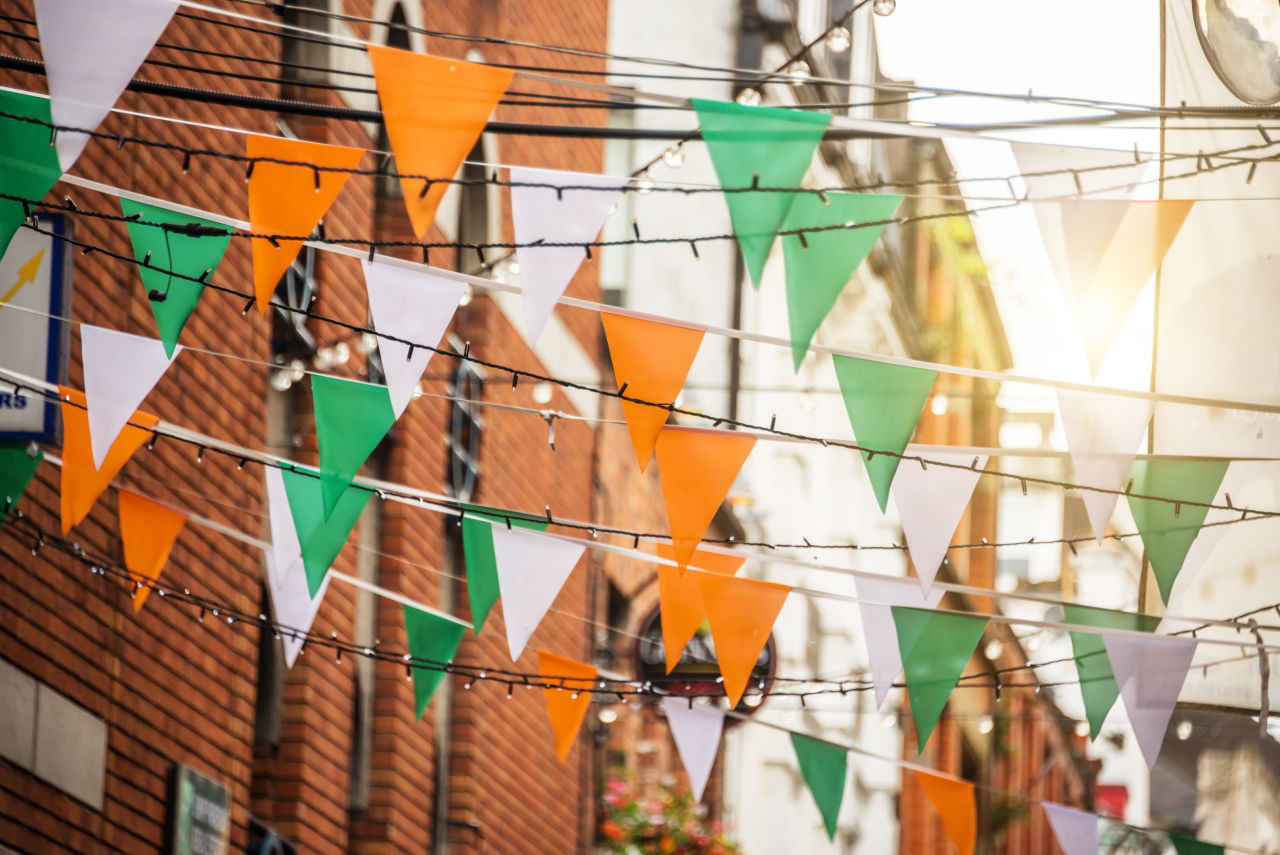 Irish flags hanging in a street on St Patrick's Day