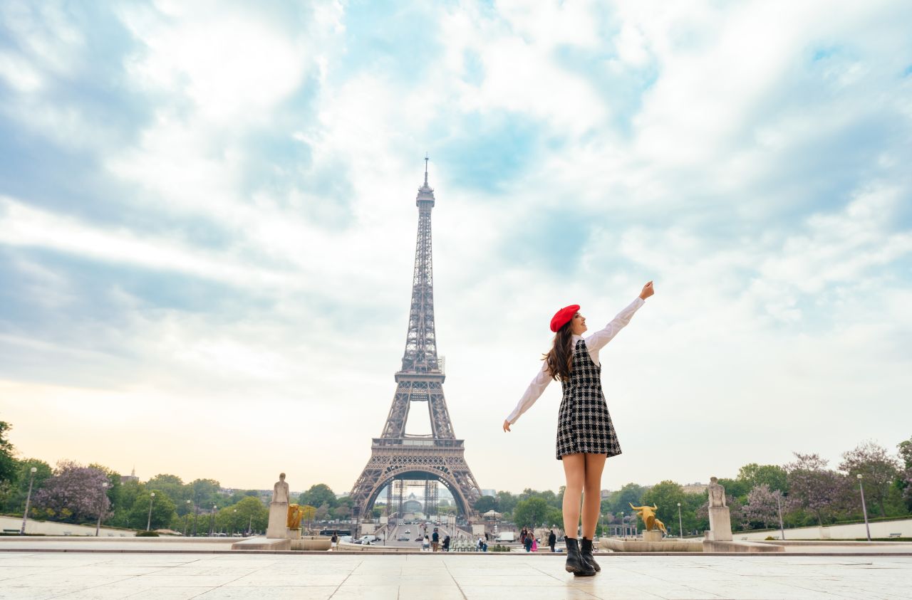 Woman with balloon in Paris by Eiffel Tower