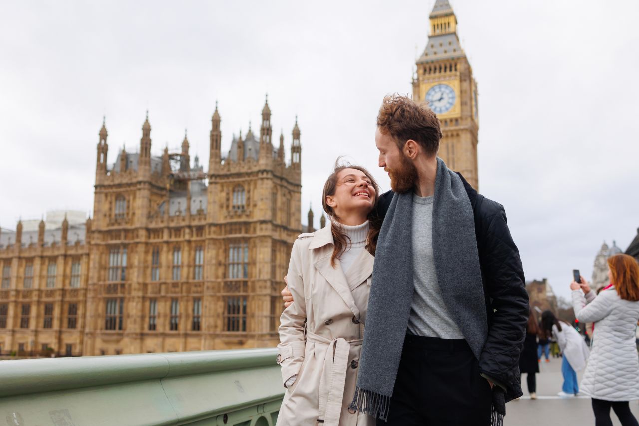 Couple Walking in London with Big Ben in the Background