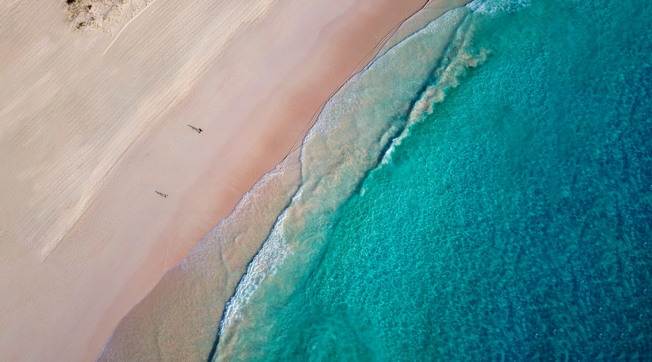 aerial view of blue ocean and pink sand beach in Bermuda