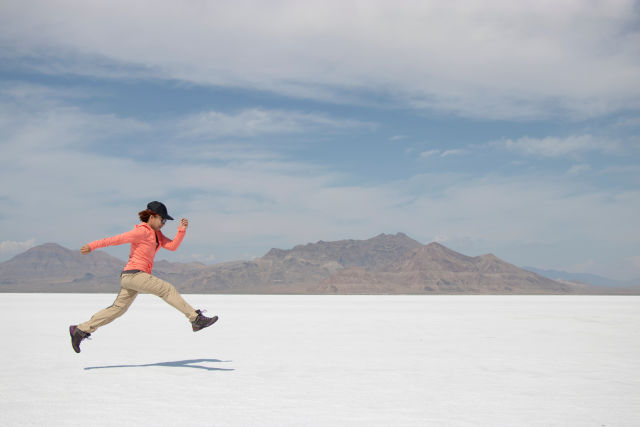 boy running on the salt flats in Utah