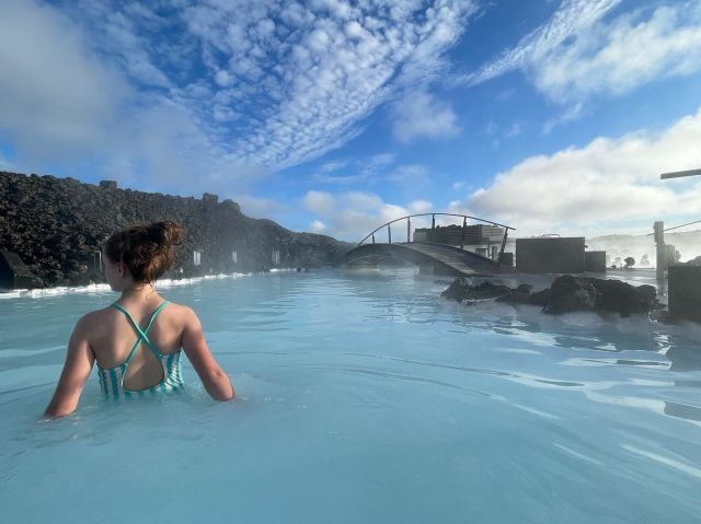 girl walking in the Blue Lagoon in Iceland