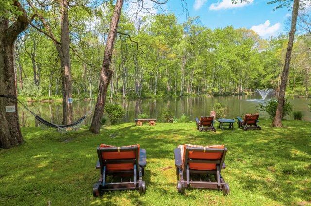 Chairs in front of the private pond