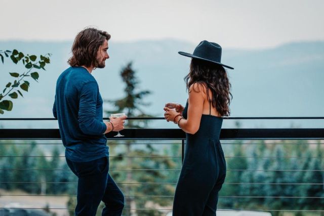 Couple at balcony at Gravity Haus Jackson Hole