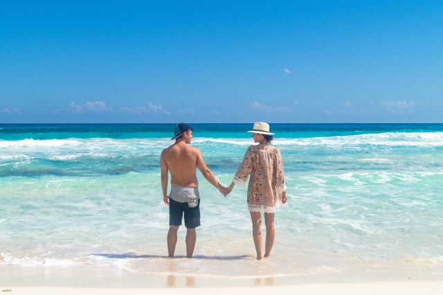 Couple on beach in Cozumel