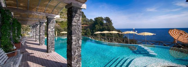 Seawater infinity pool at Hotel Porto Roca overlooking Ligurian Sea